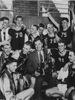 They Had Reason to Rejoice: The Concord Training School basketball team shown here after winning the Class B championship at Morgantown. Pictured, left to right, top row are Curtis Snider, Stanley Gunter, Bill Jennings, Jerry Coburn, Fred Ducan, Chester Pettrey, and George Keatley. Middle row: Dickie Peck, Jim Rogers, Coach Joe Vachon, and Ronnie Redden. Front row: Leslie Easter and Jerry Williams. (Source: Concord Trojan, 1953.)