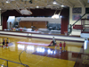 Perspective of the basketball court and stage.