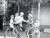 The bicycle: (l-r) Dexter (John), Sally, Joe, Chester and Henry Friedl.