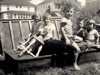 Back yard play: Mary Bowling, Kenny Robertson, Henry Friedl, Dexter (John) Friedl, and Sally Friedl.